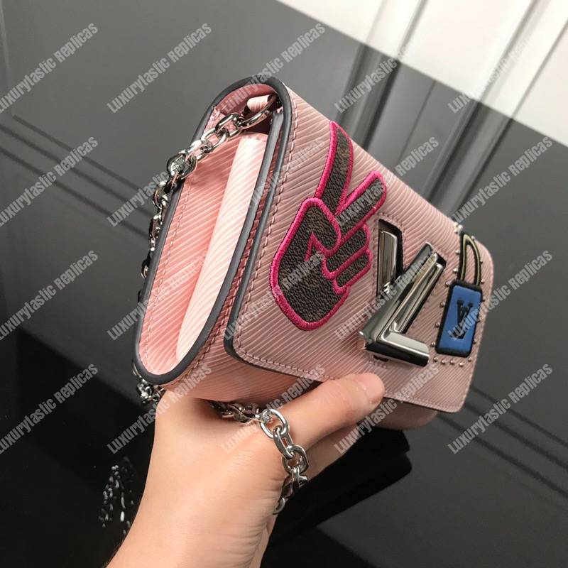 LV Twist Chain Wallet Epi Leather Travel and Trunk-Making Heritage Pink