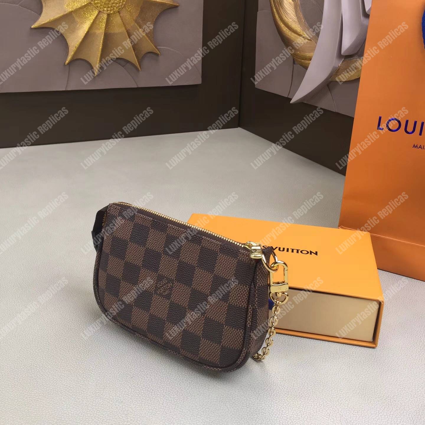 LV Mini Pochette Accessoires Damier Ebene