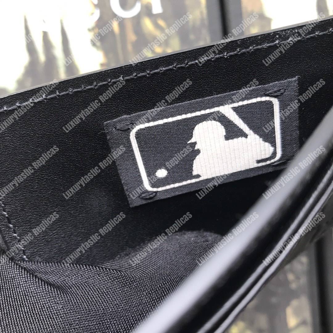 G*u*i card case with la angels patch black