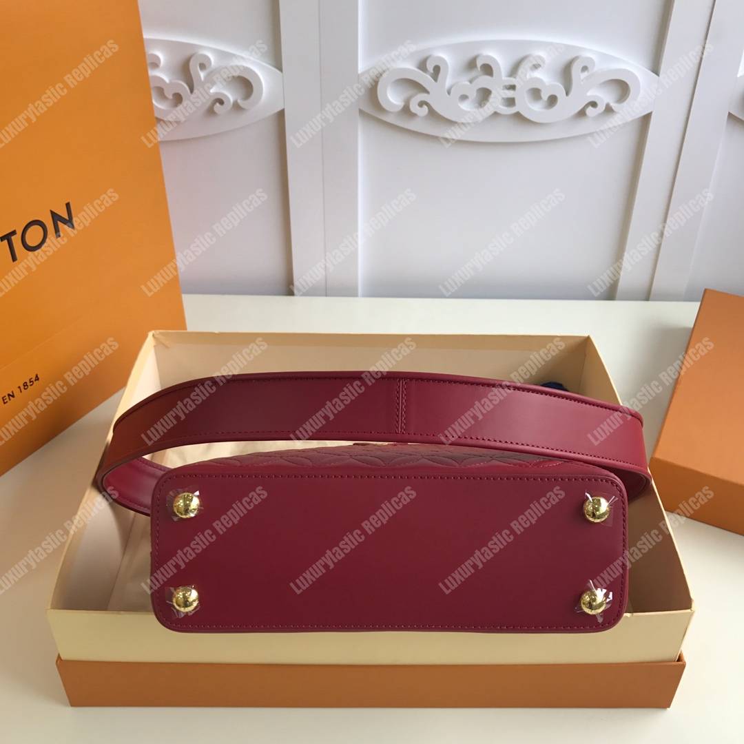 LV Capucines BB Rough Carmin