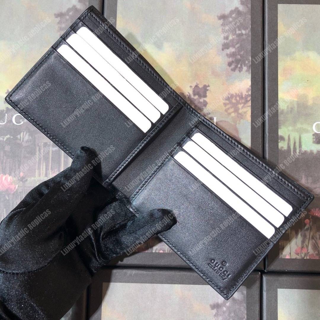 G*u*i gg sup*e wallet with wolf