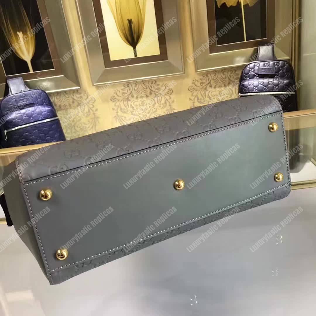 G*u*i signature medium top handle bag gray