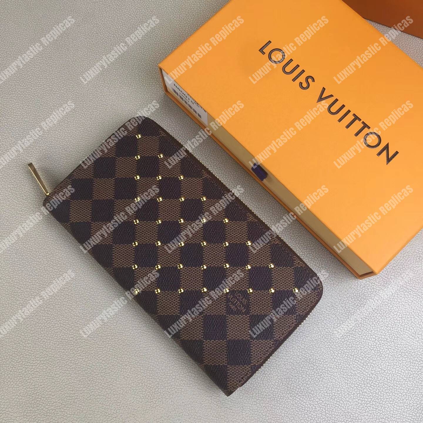 LV Zippy Wallet Damier Ebene Gold Studs