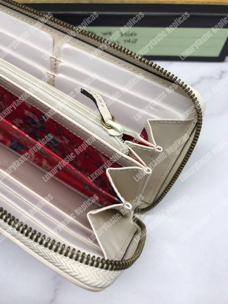 G*u*i leather zip around with double g off-white