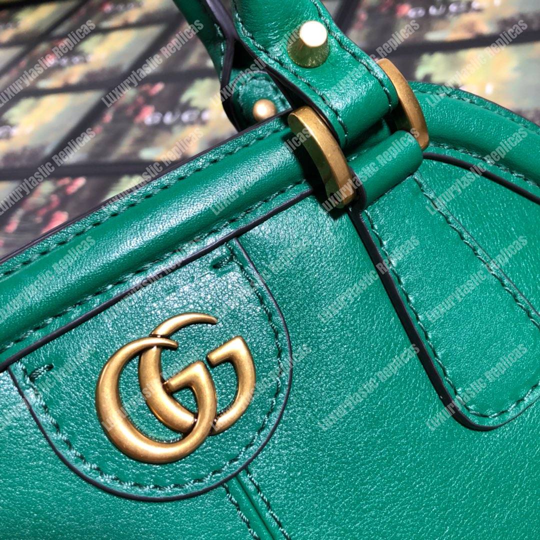 G*u*i re(belle) medium shoulder bag leather green