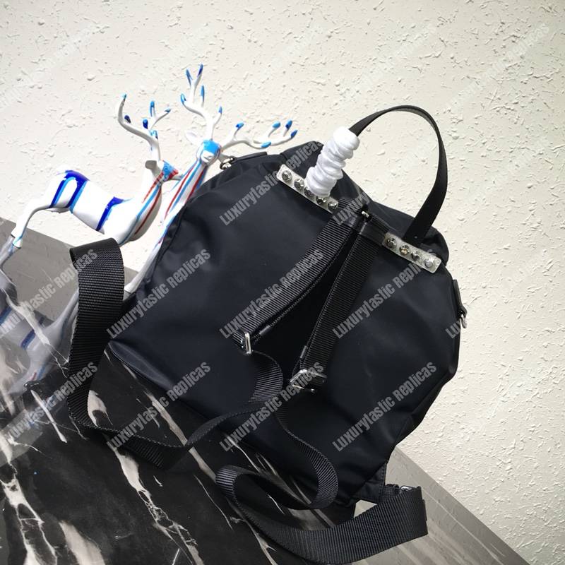 Pra*a black nylon backpack yellow