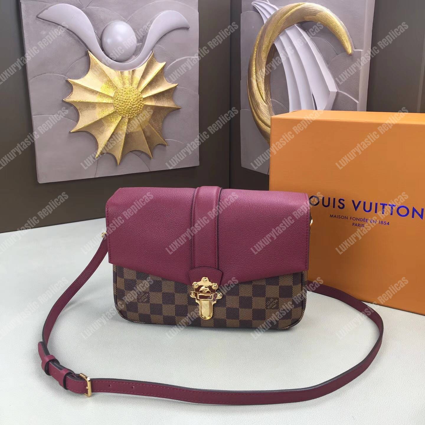 LV Clapton PM Damier Ebene Raisin