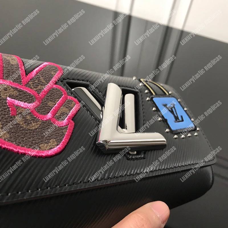 LV Twist Chain Wallet Epi Leather Travel and Trunk-Making Heritage Black