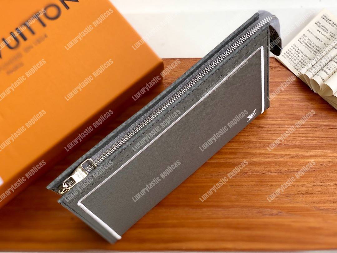 LV Pochette Voyage MM Taiga Leather Black