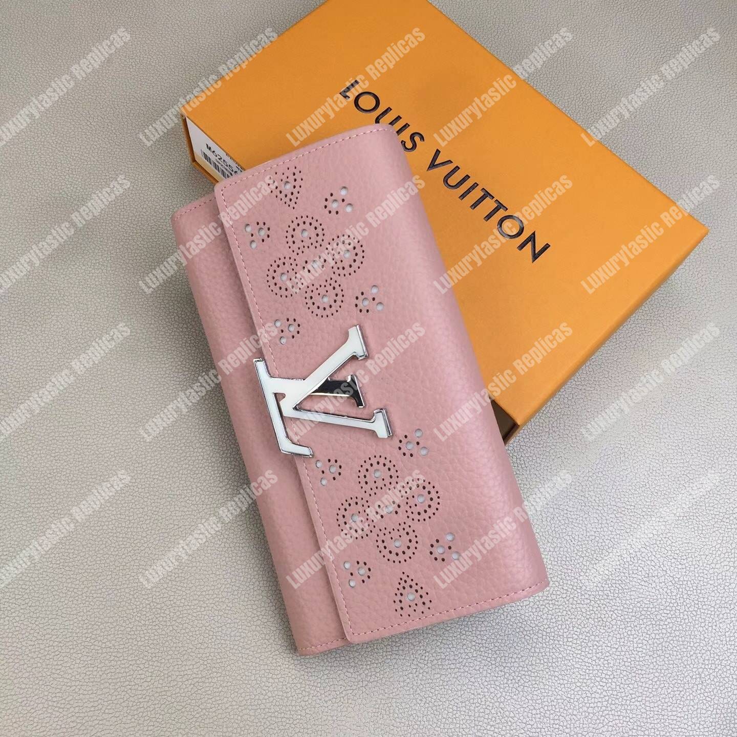 LV Capucines Wallet Magnolia