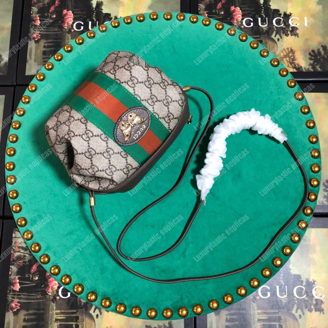 G*u*i mini gg bag with web and butterfly