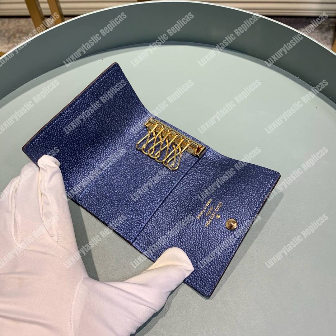 LV 6 KEY HOLDER Monogram Empreinte leather Iris