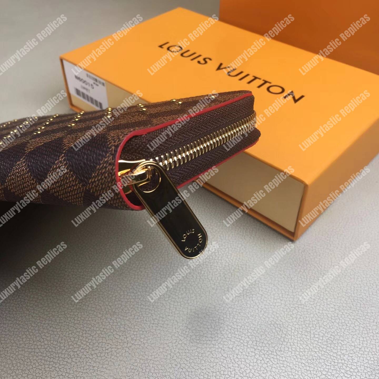 LV Zippy Wallet Damier Ebene Gold Studs