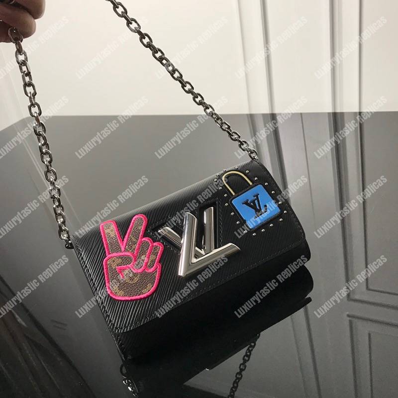 LV Twist Chain Wallet Epi Leather Travel and Trunk-Making Heritage Black