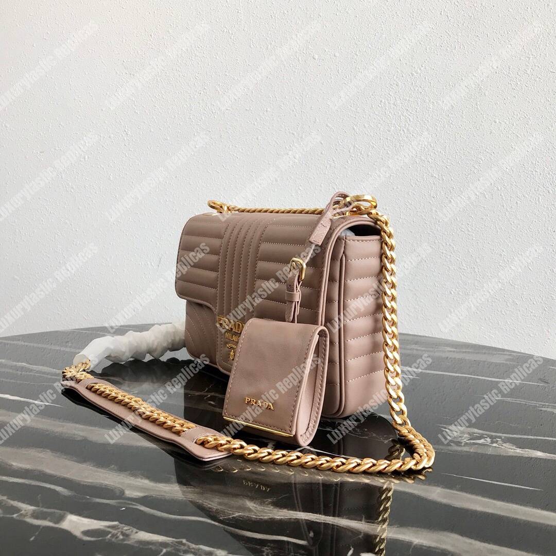 Pra*a diagramme medium leather bag magnolia
