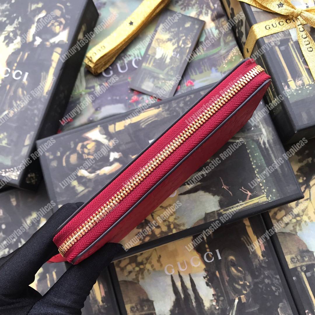 G*u*i signature zip around leather wallet red