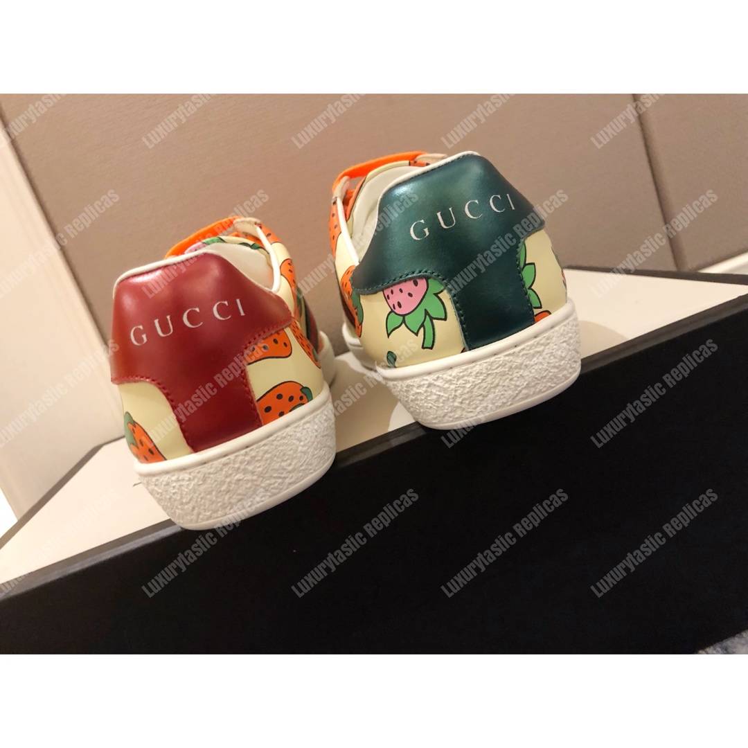 G*u*i ace sneaker with G*u*i strawberry print