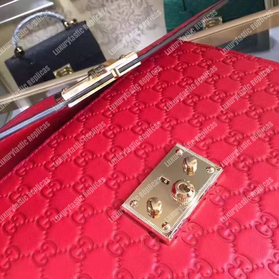 G*u*i padlock medium signature top handle bag red