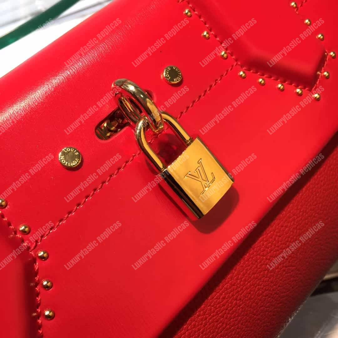 LV Pochette City Steamer Taurillon Leather