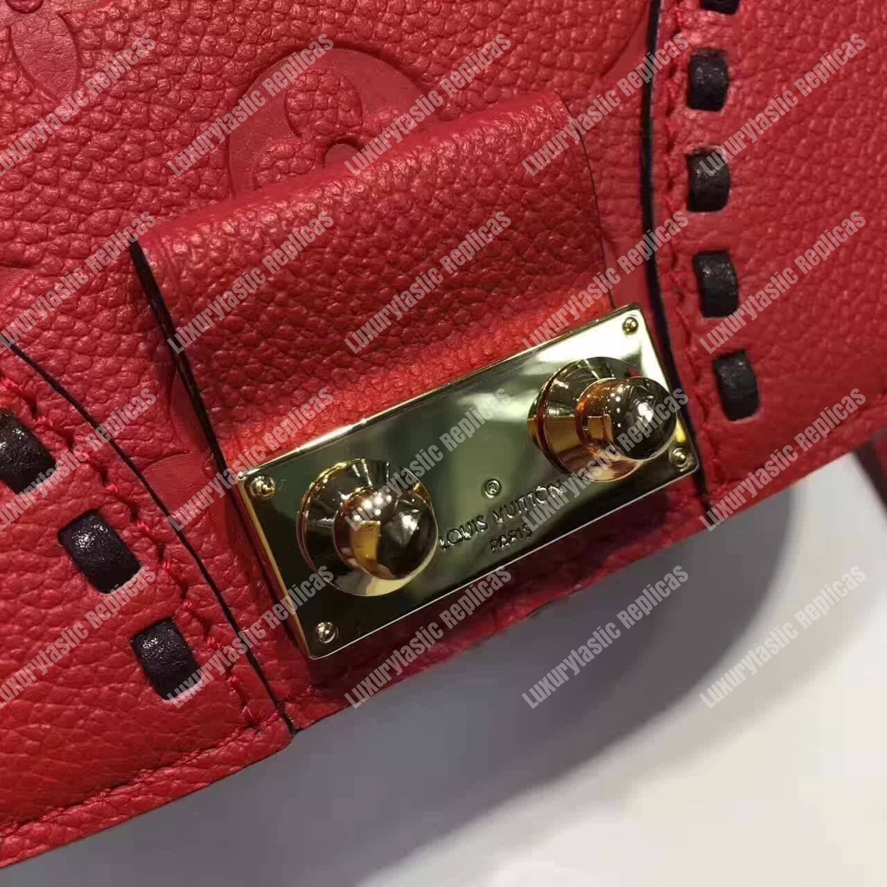 LV Junot Monogram Empreinte Leather Cerise
