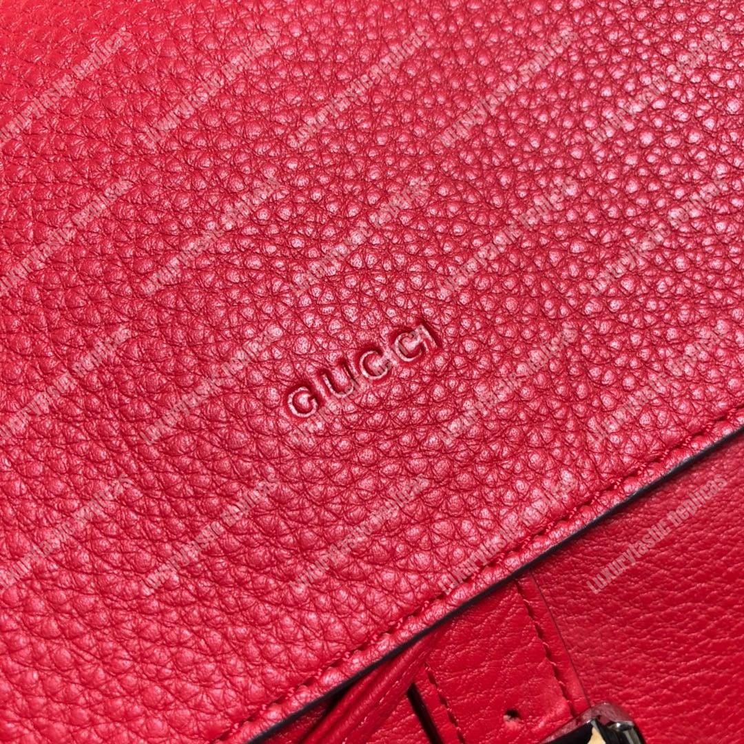 G*u*i leather bamboo tassel backpack hibiscus red