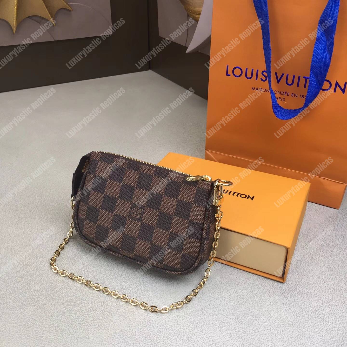 LV Mini Pochette Accessoires Damier Ebene