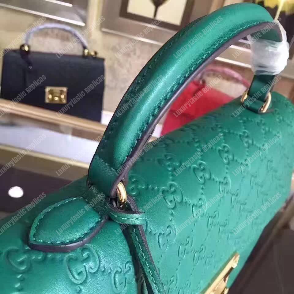 G*u*i padlock medium signature top handle bag emerald green