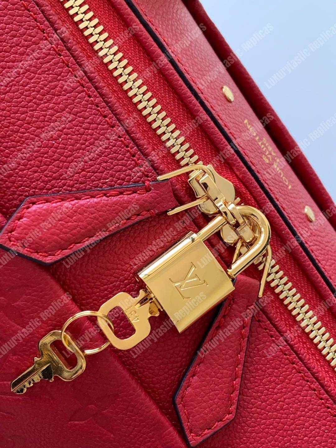 LV Speedy Bandouliere 25 Monogram Empreinte Leather Scarlet