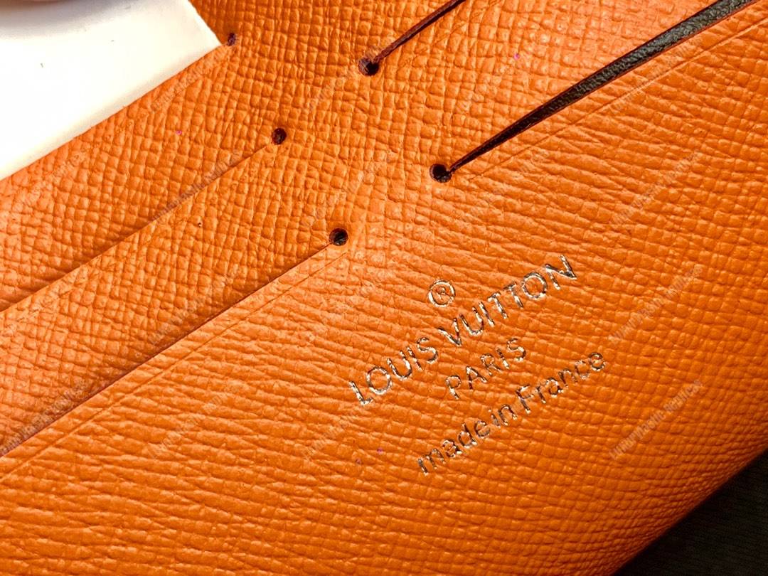 LV Pochette Voyage MM Orange