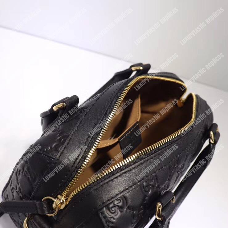 G*u*i signature small top handle bag black