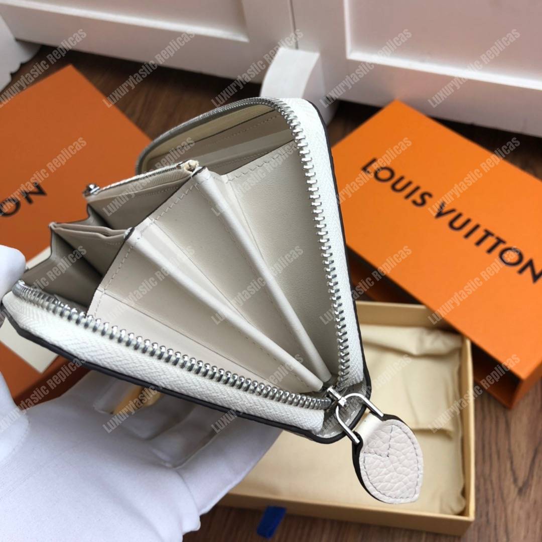 LV Zippy Wallet Mahina Leather Ivory