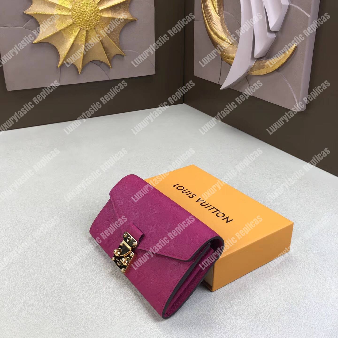 LV Metis Wallet Monogram Empreinte Leather Freesia