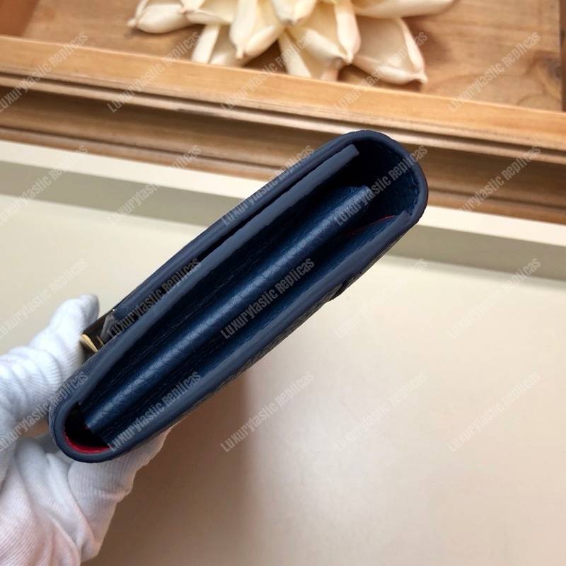 LV Capucines Wallet Taurillon Marine Rouge