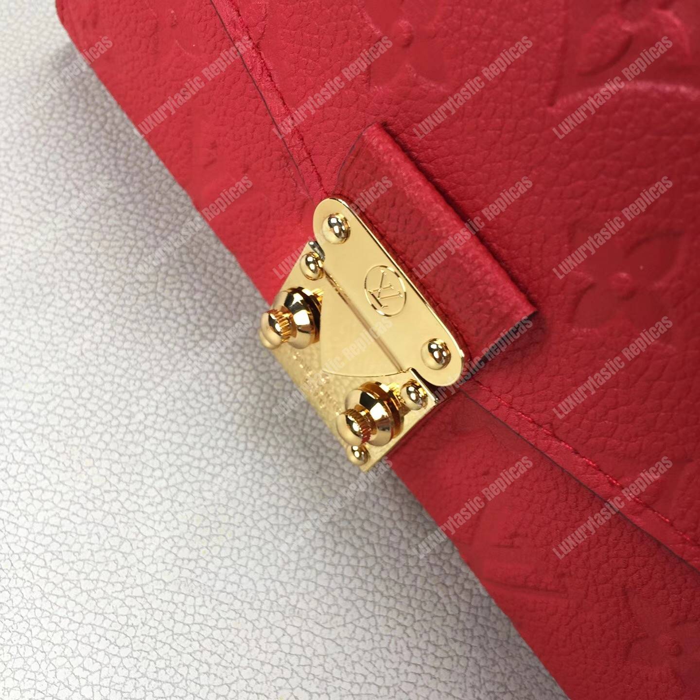 LV Metis Wallet Monogram Empreinte Leather Scarlet