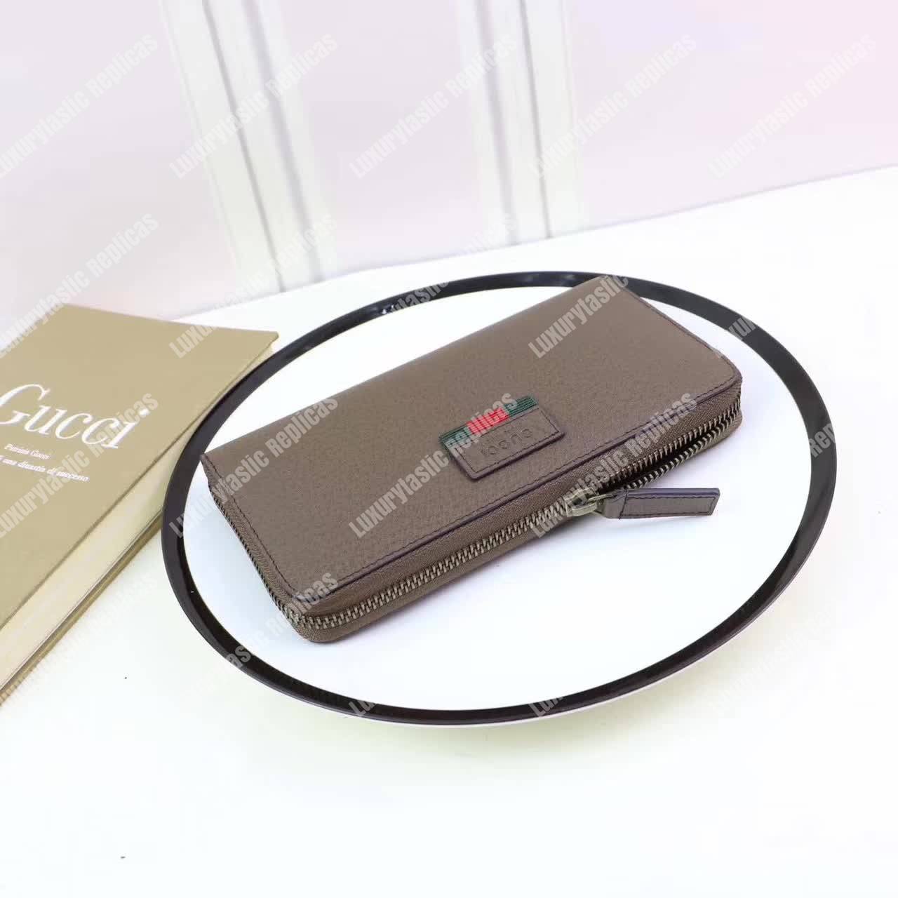 G*u*i leather zip around wallet with web brown