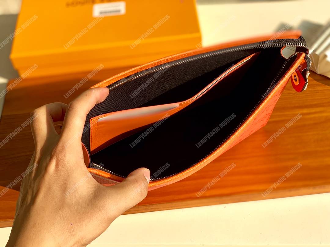 LV Pochette Voyage MM Orange