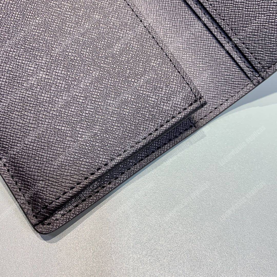 lv brazza taiga articles de voyage l**is V*t*n malletier wallet noir