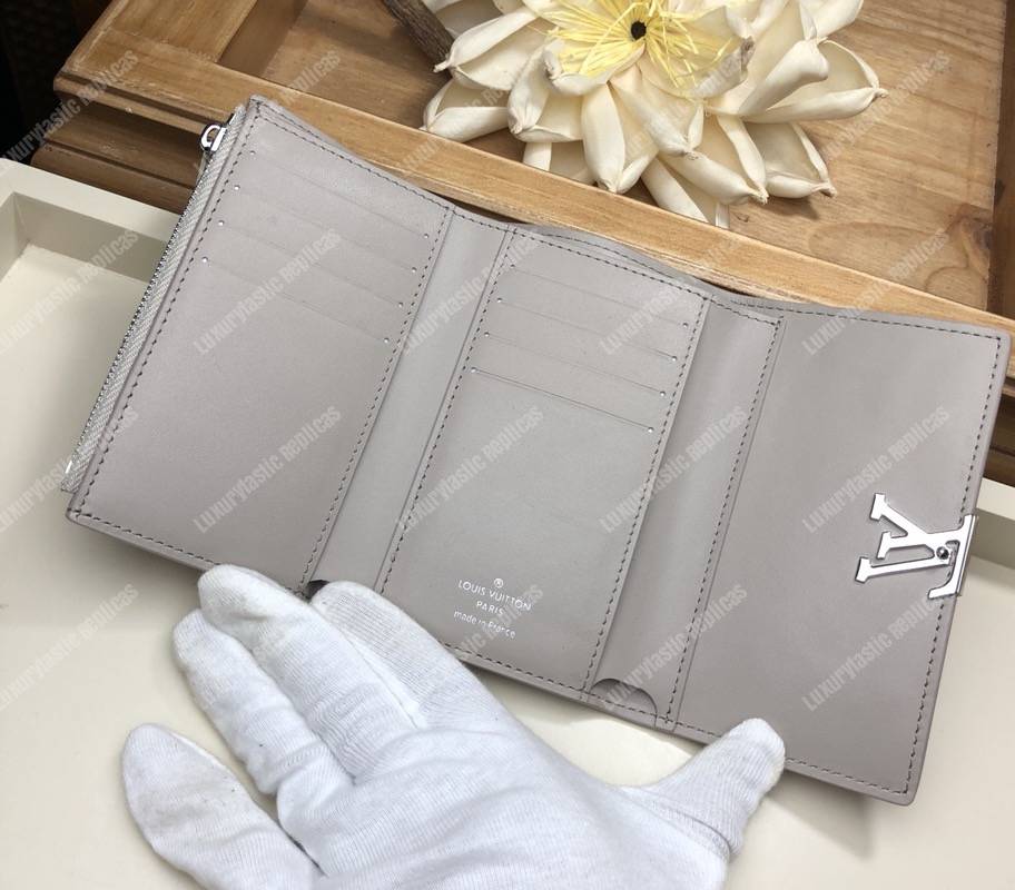 LV Capucines Compact Wallet Taurillon Magnolia Leather Monogram Flowers