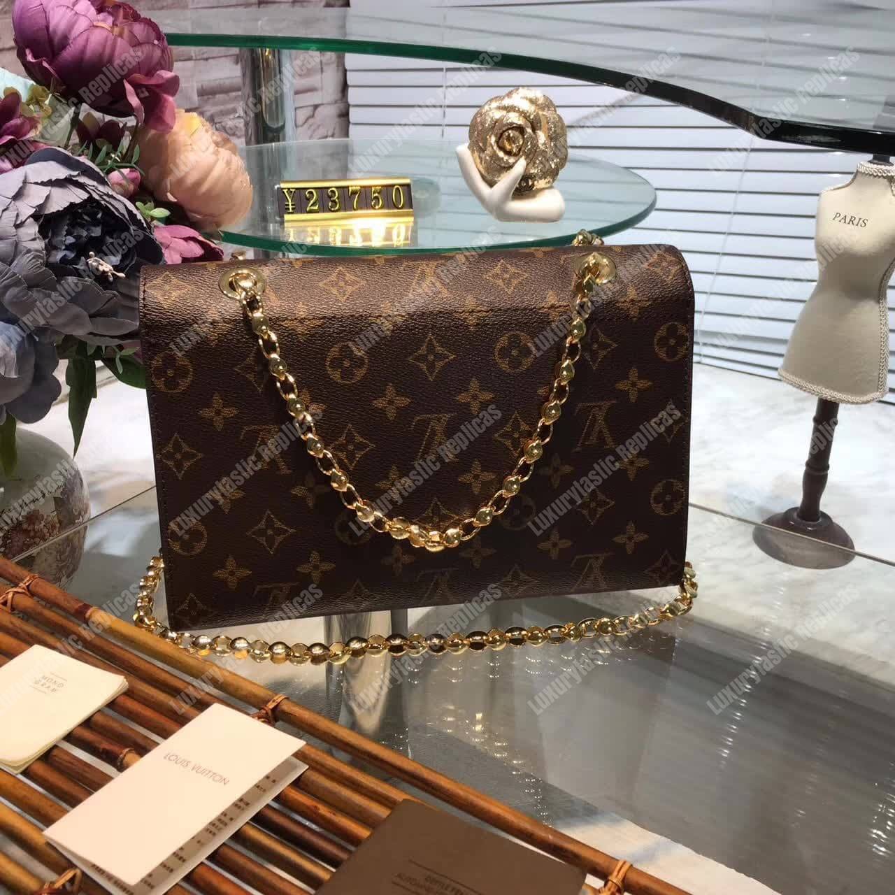 LV Victoire Bag Python