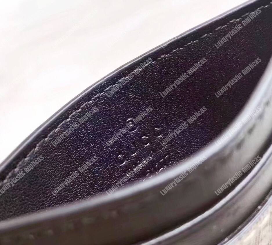 G*u*i tiger print gg sup*e card case