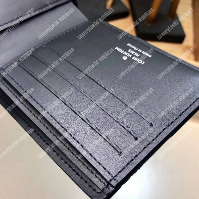 LV Multiple Wallet Taurillon Leather Blue Initials