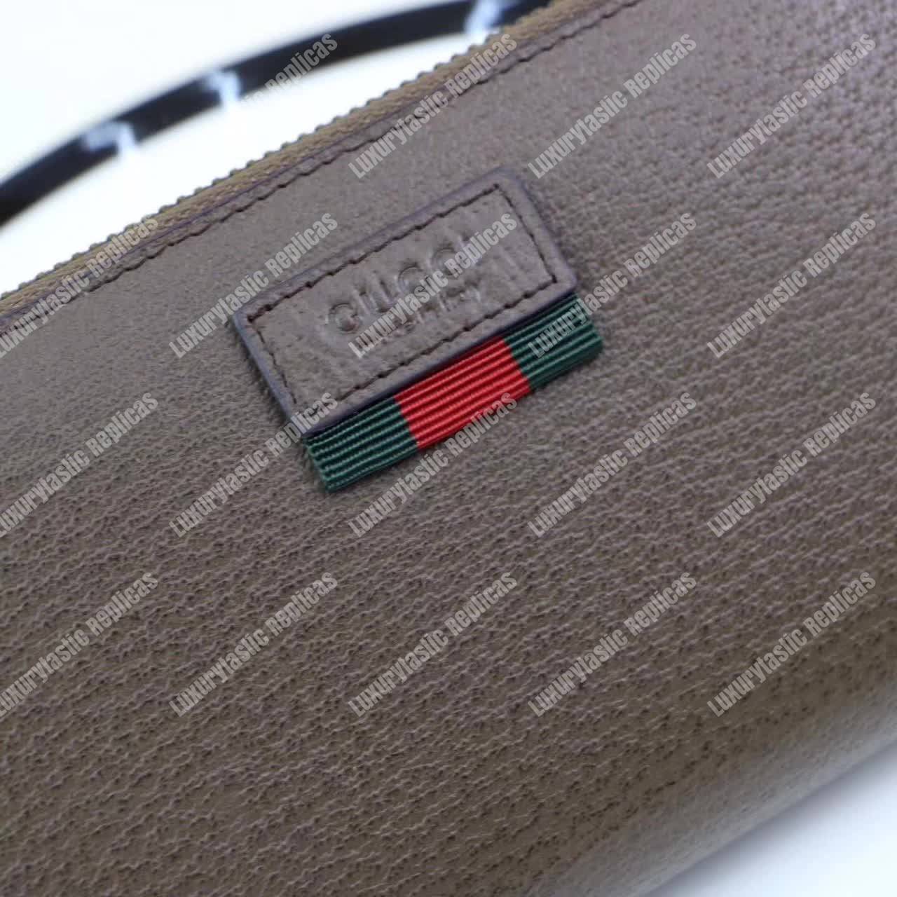 G*u*i leather zip around wallet with web brown