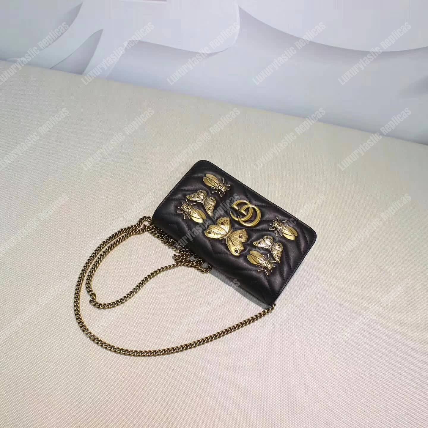 G*u*i gg marmont animal studs mini bag black