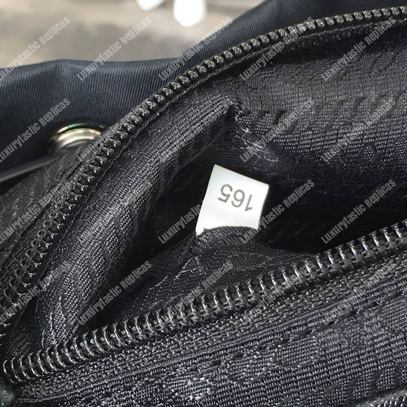 Pra*a black nylon backpack yellow
