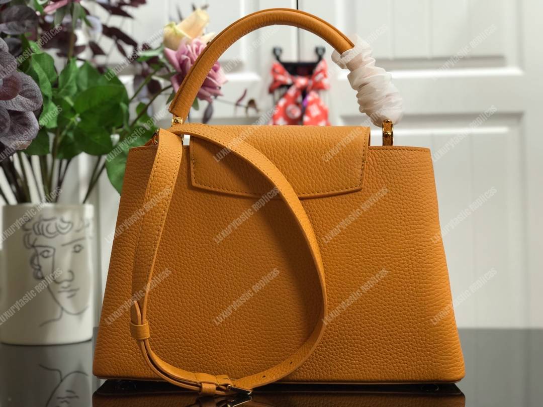 LV Capucines PM Taurillon Leather Ocre