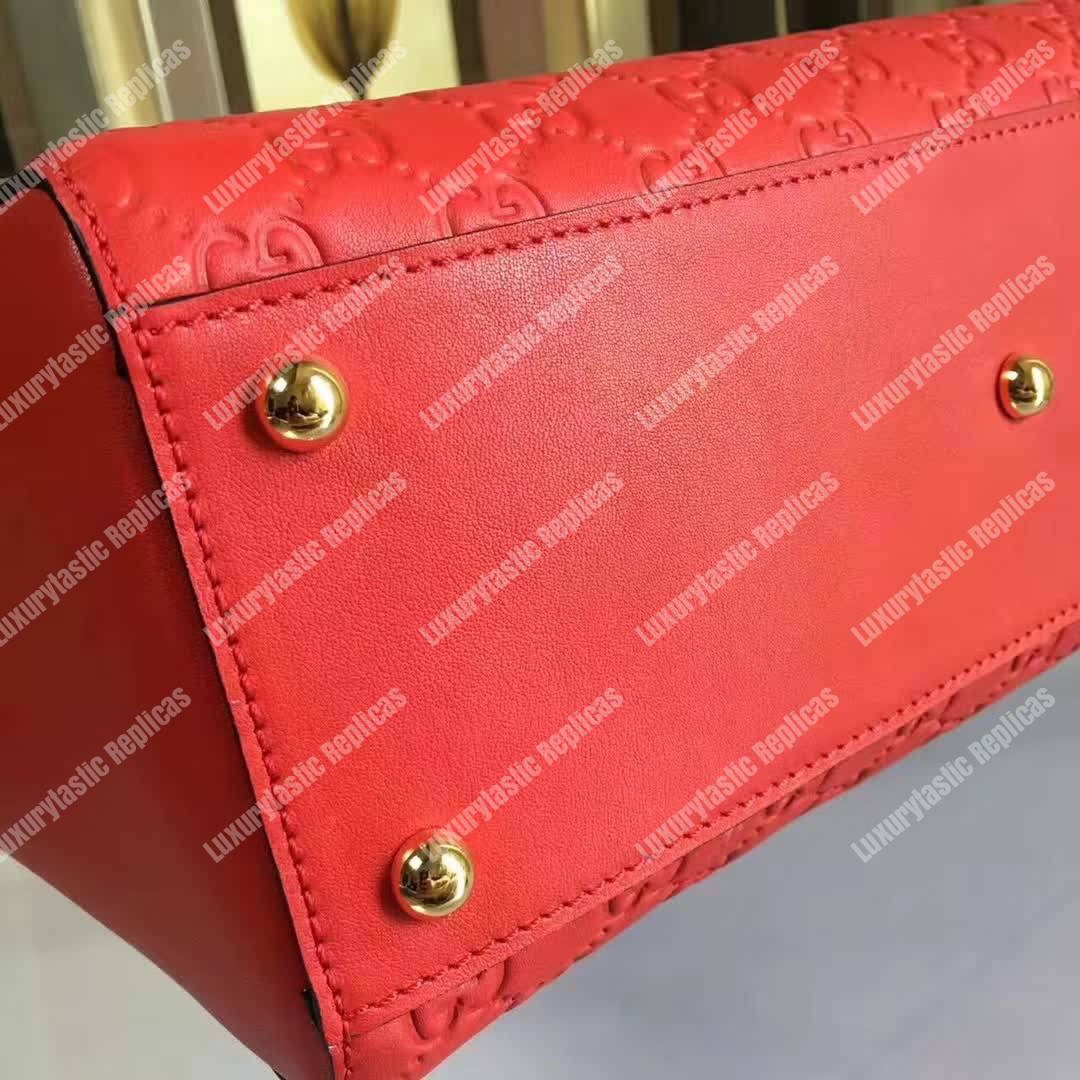 G*u*i signature medium top handle bag red