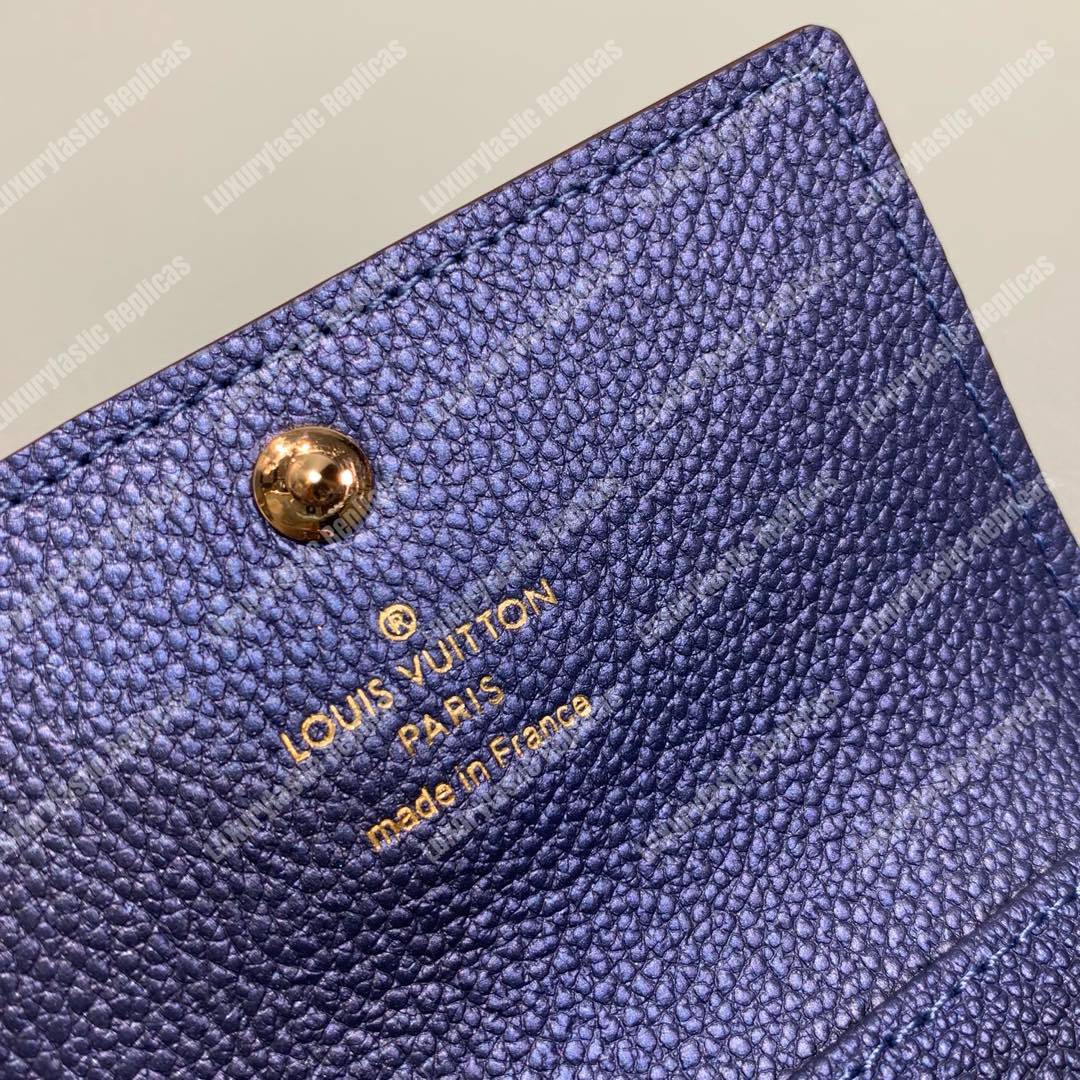 LV 6 KEY HOLDER Monogram Empreinte leather Iris