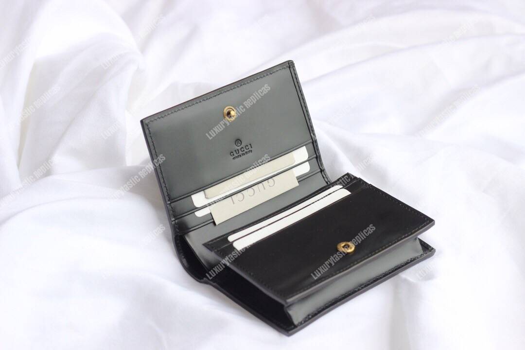 G*u*i signature card case with cat