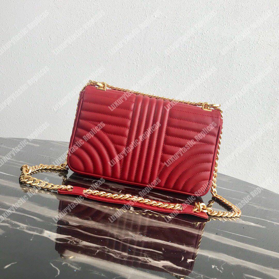 Pra*a diagramme medium leather bag red