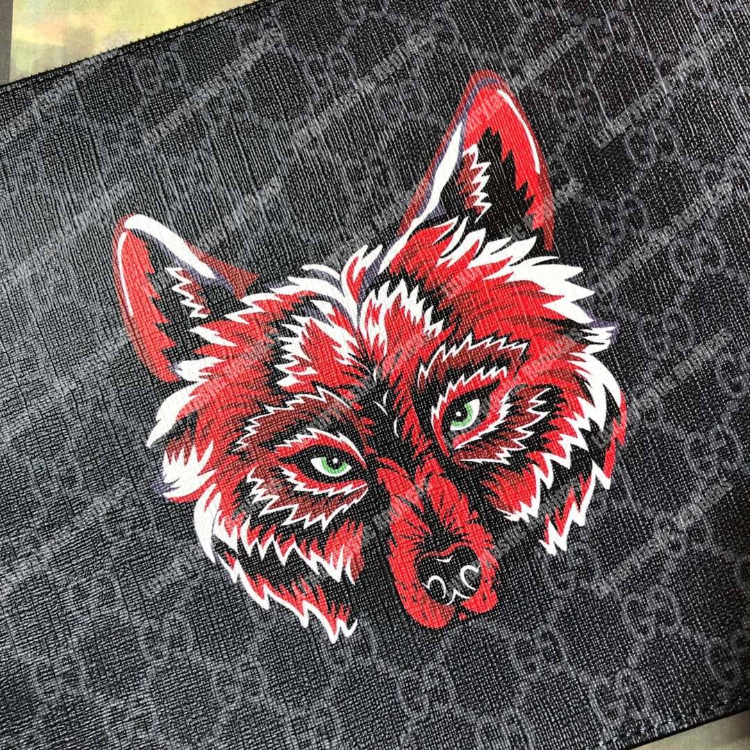 G*u*i gg sup*e pouch with wolf